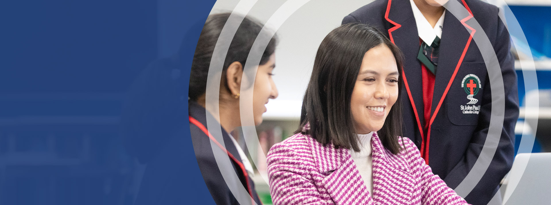 Teacher with her students in the classroom at St John Paul II Catholic College Schofields