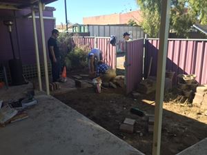 The Womens Cottage Laying Pavers 1