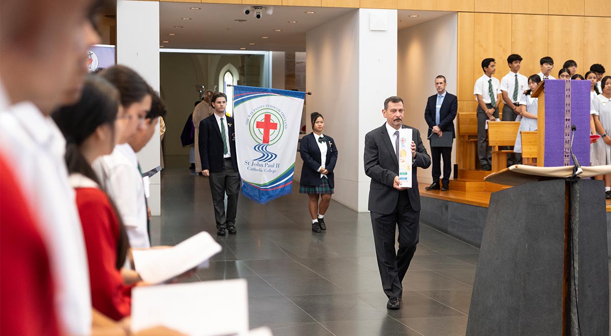 St John Paul II Schofeields Leadership carrying school banner into Saint Patrick's Cathedral