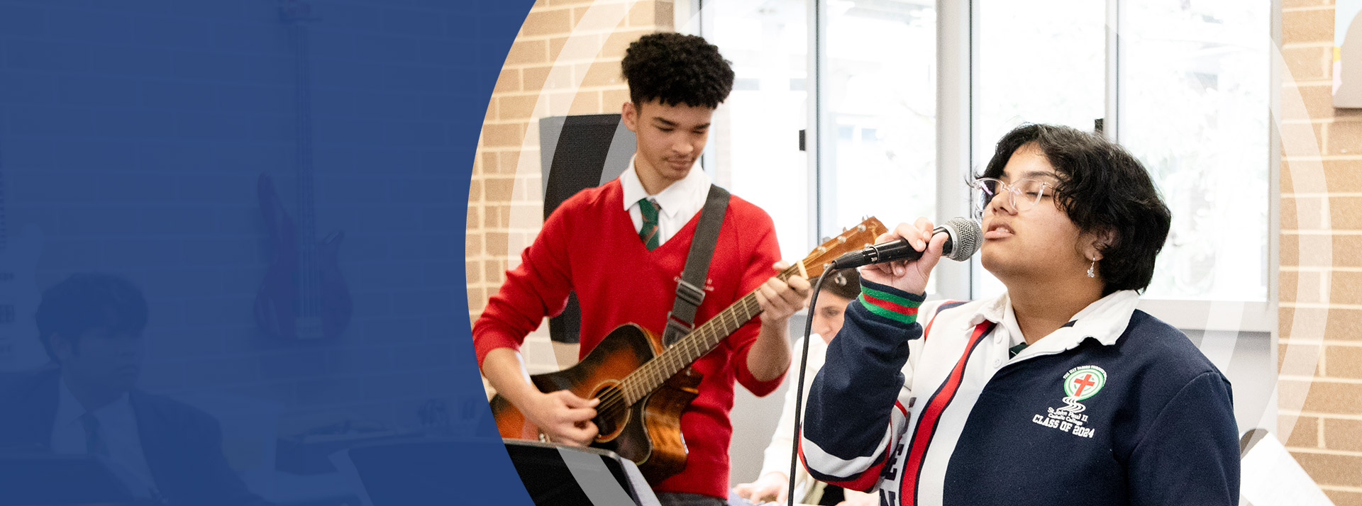 Students practising music in the music room at St John Paul II Catholic College Schofields
