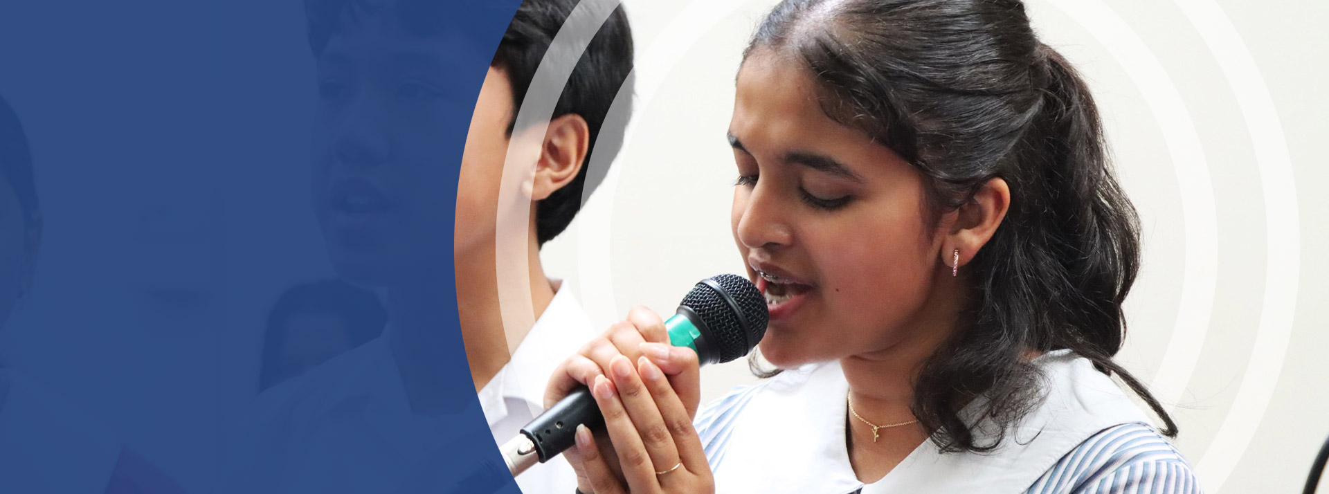 Student singing in the school band at St John Paul II Catholic College Schofields and Nirimba