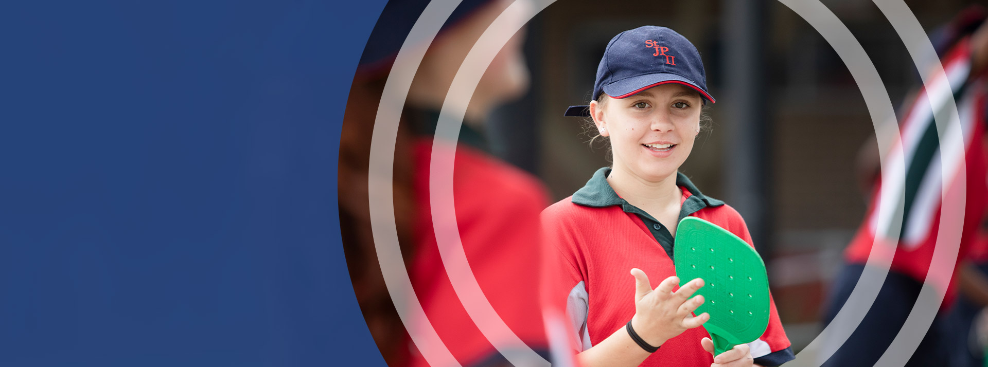 Student playing mini tennis during sport at St John Paul II Catholic College Schofields