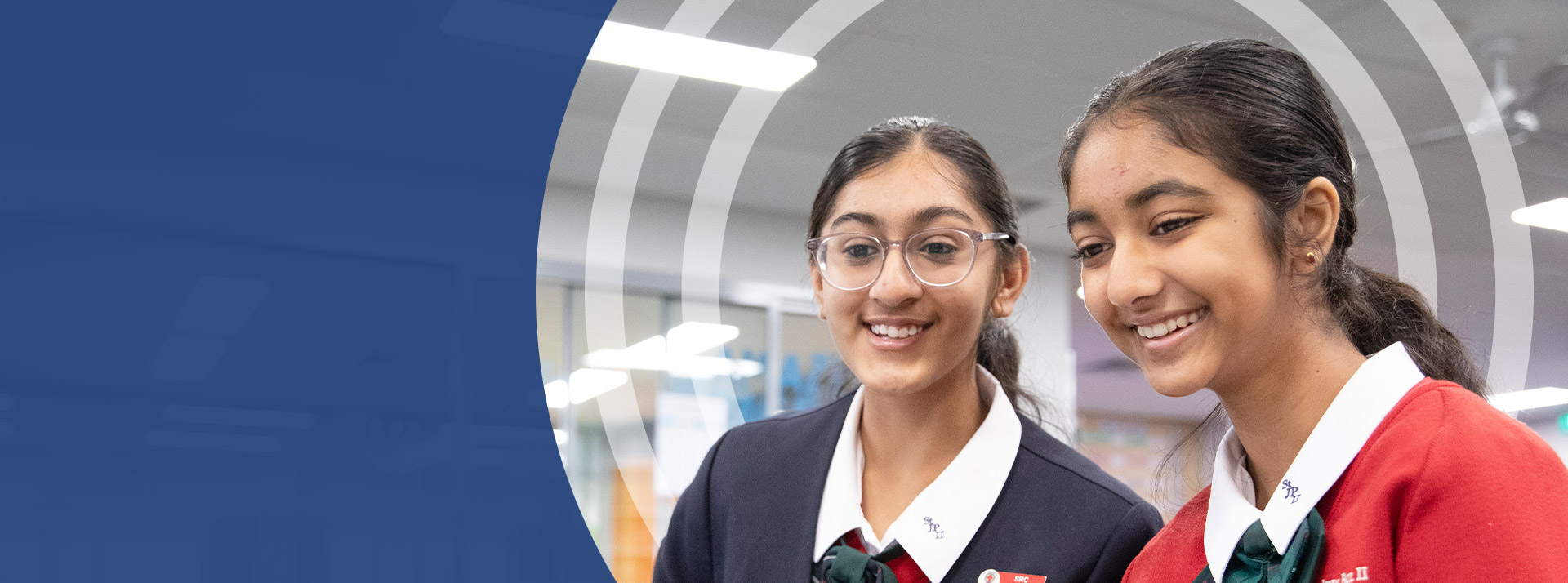 Students sitting together in the classroom at St John Paul II Catholic College Schofields and Nirimba