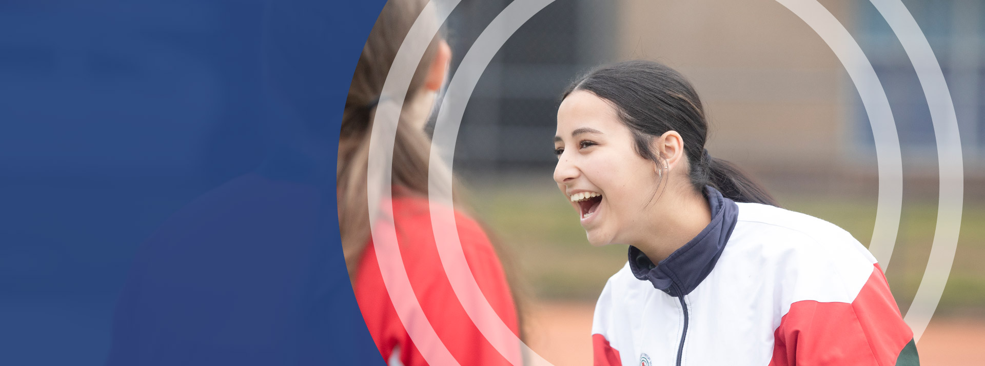 Student playing basketball on the basketball court at St John Paul II Catholic College Schofields