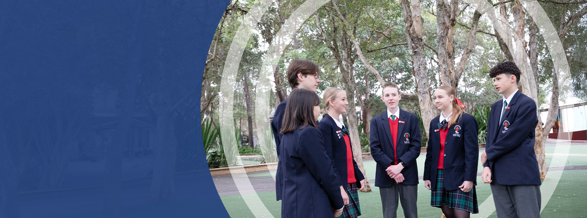 Students standing together in the courtyard at St John Paul II Catholic College Schofields