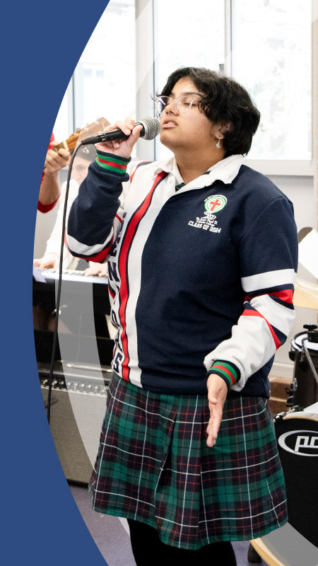 Students practising music in the music room at St John Paul II Catholic College Schofields