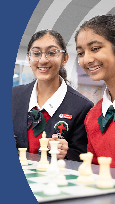 Students sitting together in the classroom at St John Paul II Catholic College Schofields and Nirimba