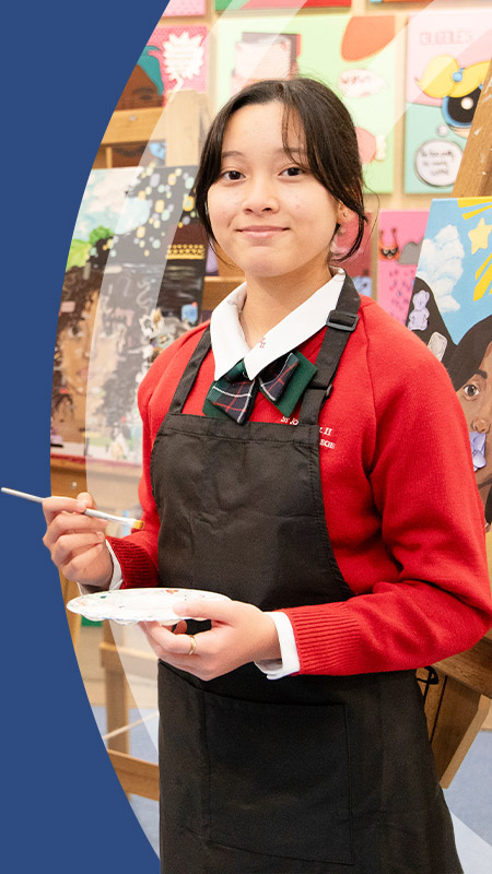 Students painting in the art room at St John Paul II Catholic College Schofields and Nirimba