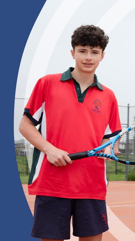 Students holding their tennis racket outside at St John Paul II Catholic College Schofields 