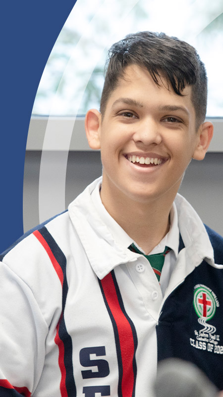 Student smiling in the classroom at St John Paul II Catholic College Schofields