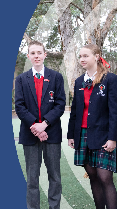 Students standing together in the courtyard at St John Paul II Catholic College Schofields