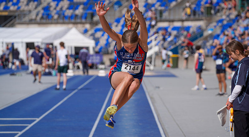 Student representing St John Paul II Catholic College Schofields in long jump