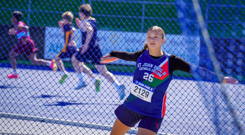 A student representing St John Paul II Catholic College Schofields in discus