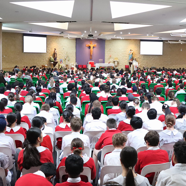 Students attending mass at St John Paul II Catholic College Schofields