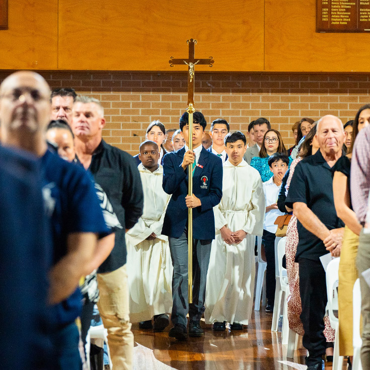 Students during the eucharistic procession at St John Paul II Catholic College Schofields